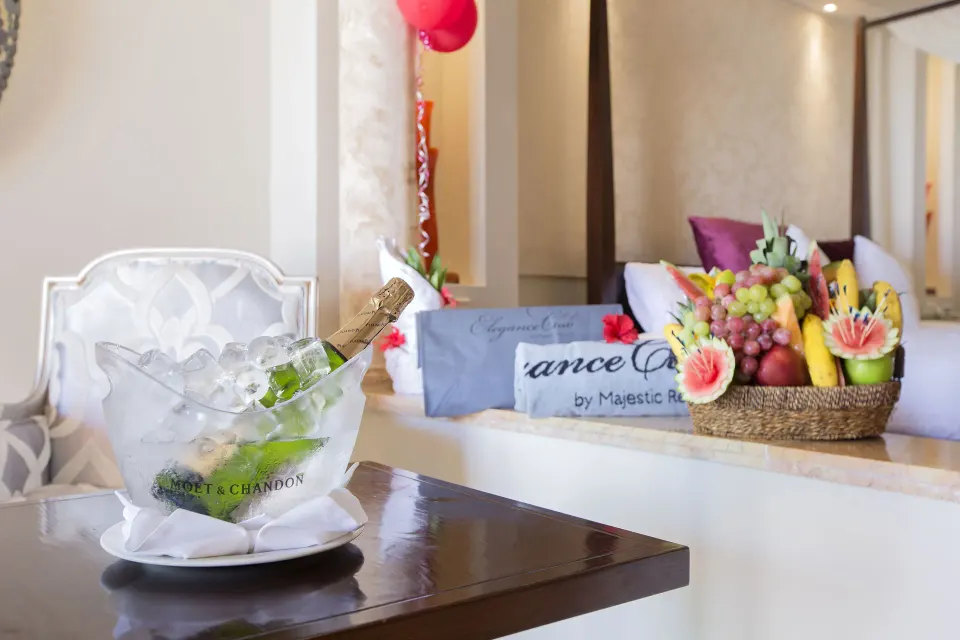 Welcome champagne and fruit basket in a suite at Majestic Elegance Punta Cana.