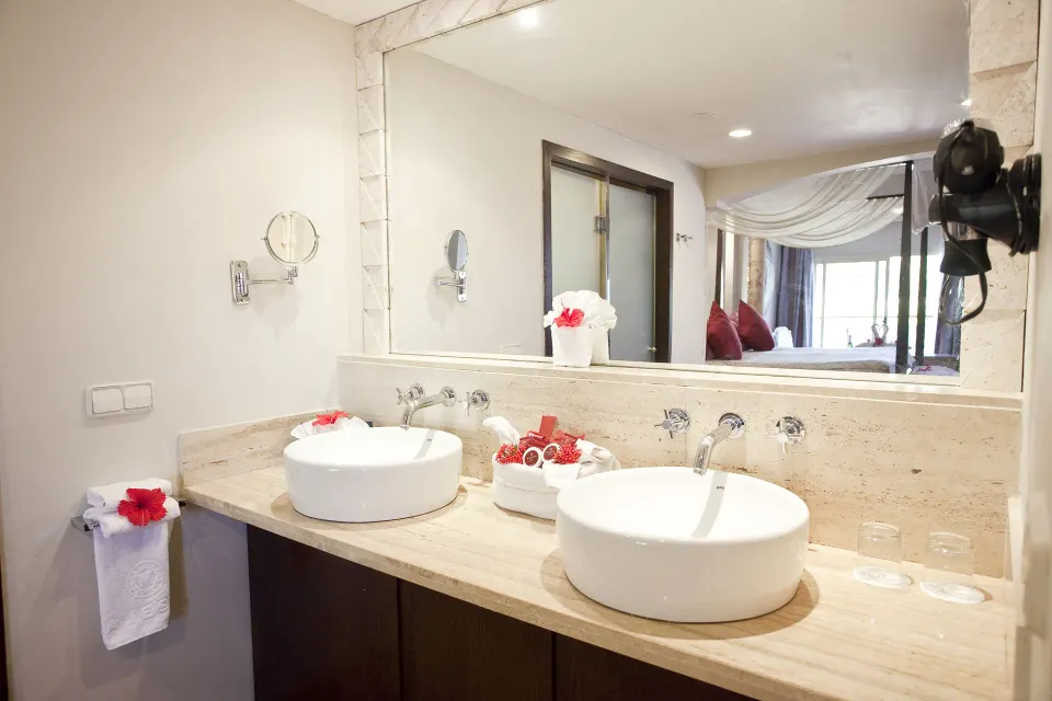 Elegance Club Ocean View Suite double vanity bathroom at Majestic Elegance Punta Cana.