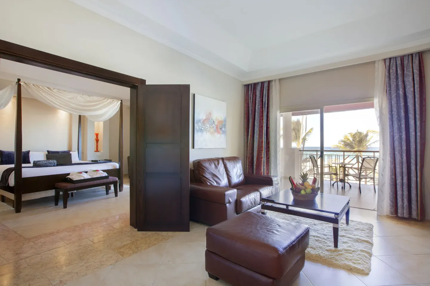 Elegance Club Ocean View Suite sitting area and balcony at Majestic Elegance Punta Cana.