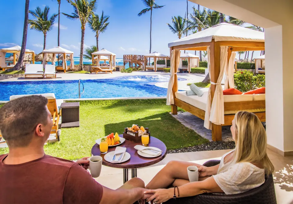 Terrace breakfast by the swim-up pool at Majestic Elegance Punta Cana.