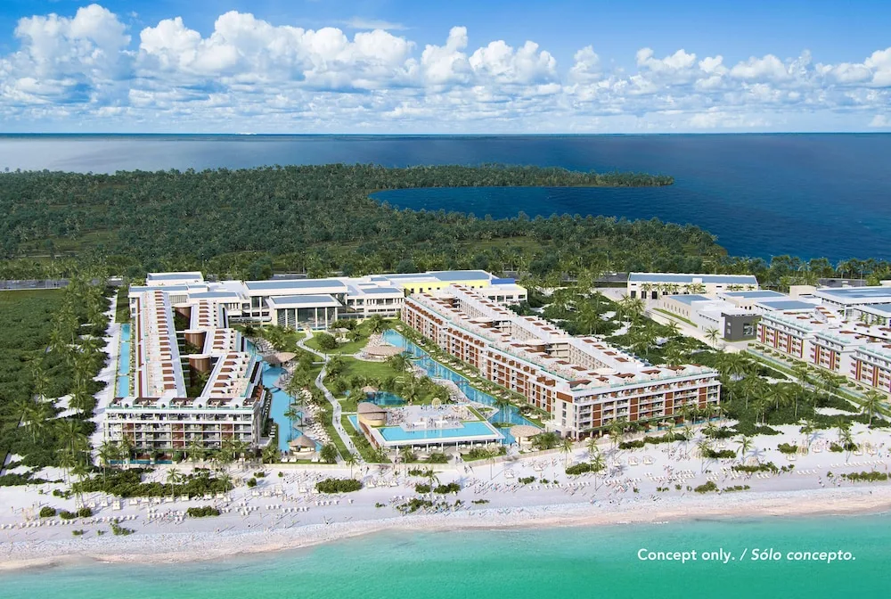 Aerial concept view of the beachfront resort and pools at Majestic Mirage Costa Mujeres.