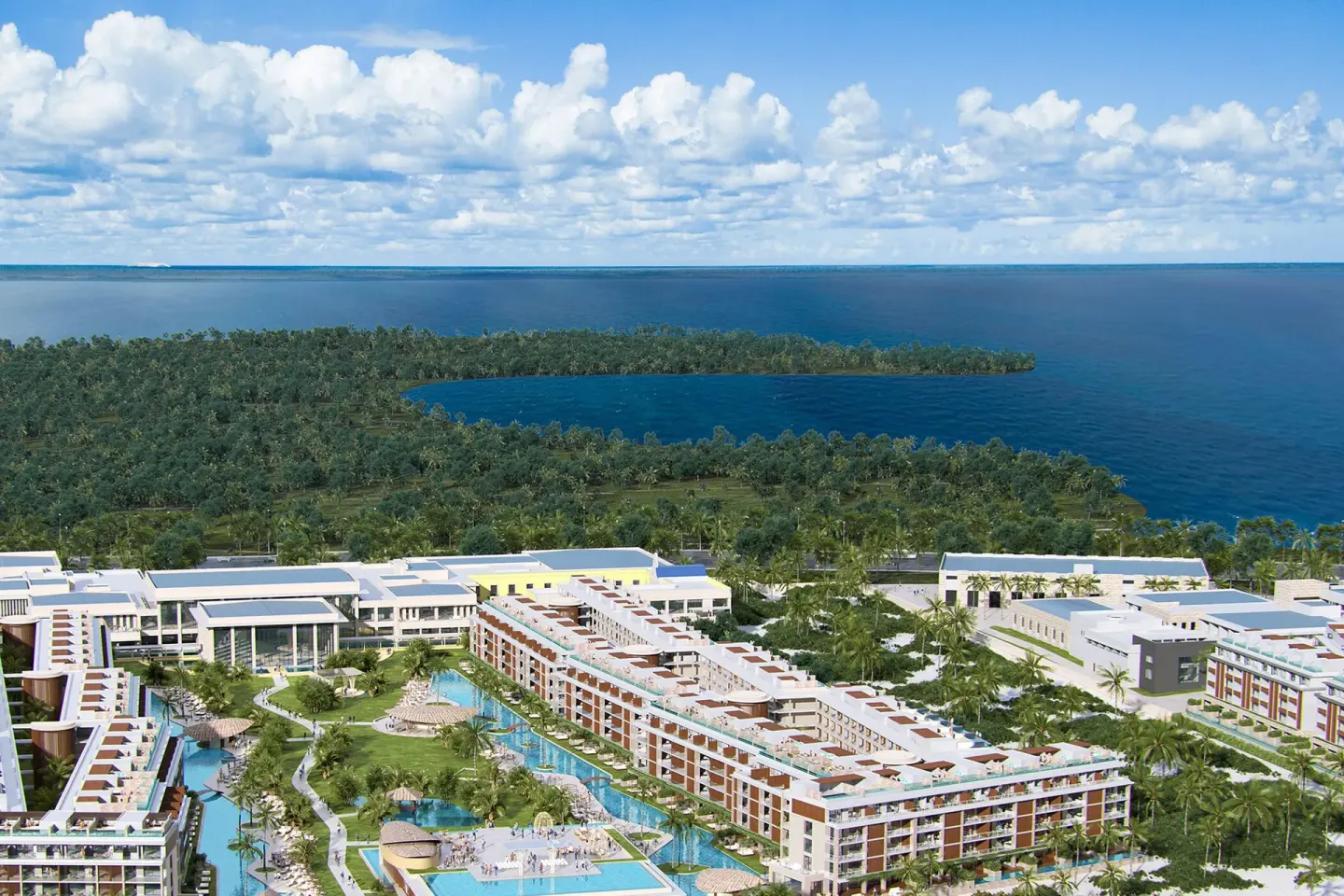 Aerial view of resort buildings, pools, and coastline at Majestic Mirage Costa Mujeres.