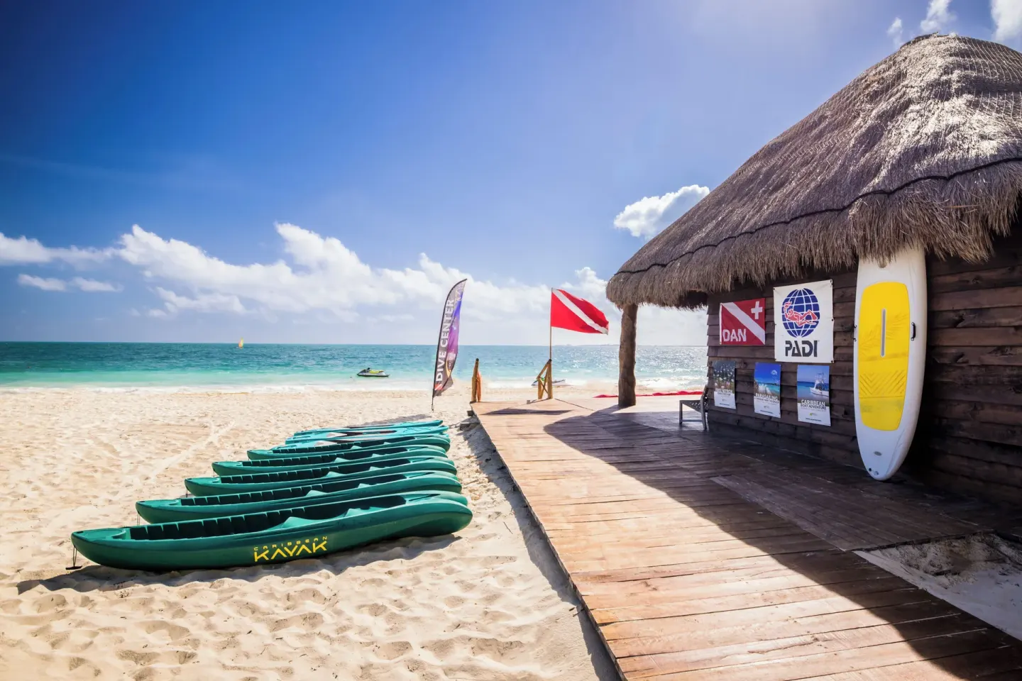Beach water sports hut with kayaks at Majestic Mirage Costa Mujeres.
