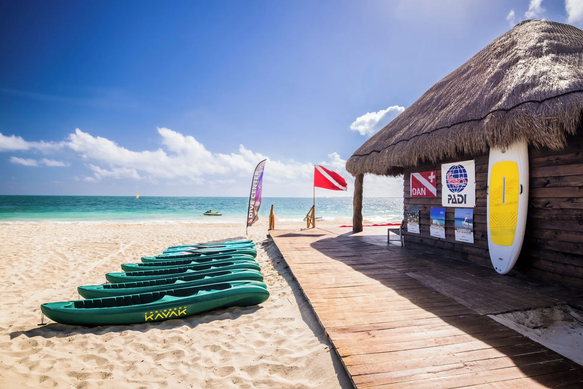 Beach water sports hut with kayaks at Majestic Mirage Costa Mujeres.