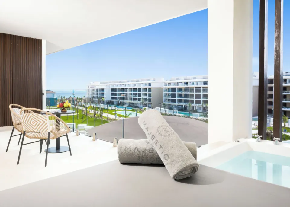 Family Club One Bedroom Suite balcony Jacuzzi and seating at Majestic Mirage Costa Mujeres.