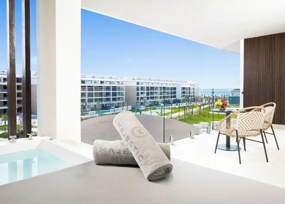 Outdoor Jacuzzi terrace of a Mirage Club One Bedroom Suite at Majestic Mirage Costa Mujeres.