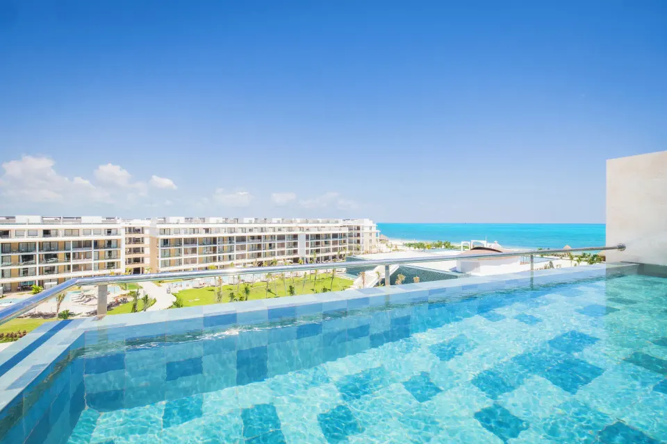 Private plunge pool with sky and ocean views at Majestic Mirage Costa Mujeres.