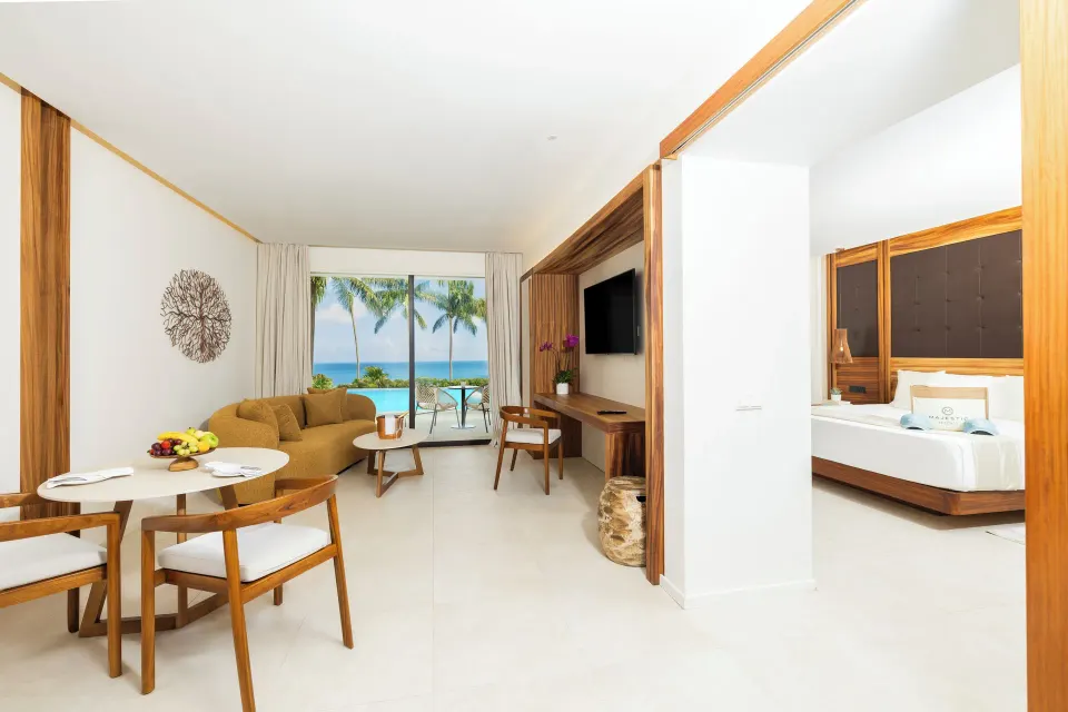 Mirage Club Swim Up Suite Oceanfront living and bedroom areas at Majestic Mirage Costa Mujeres.
