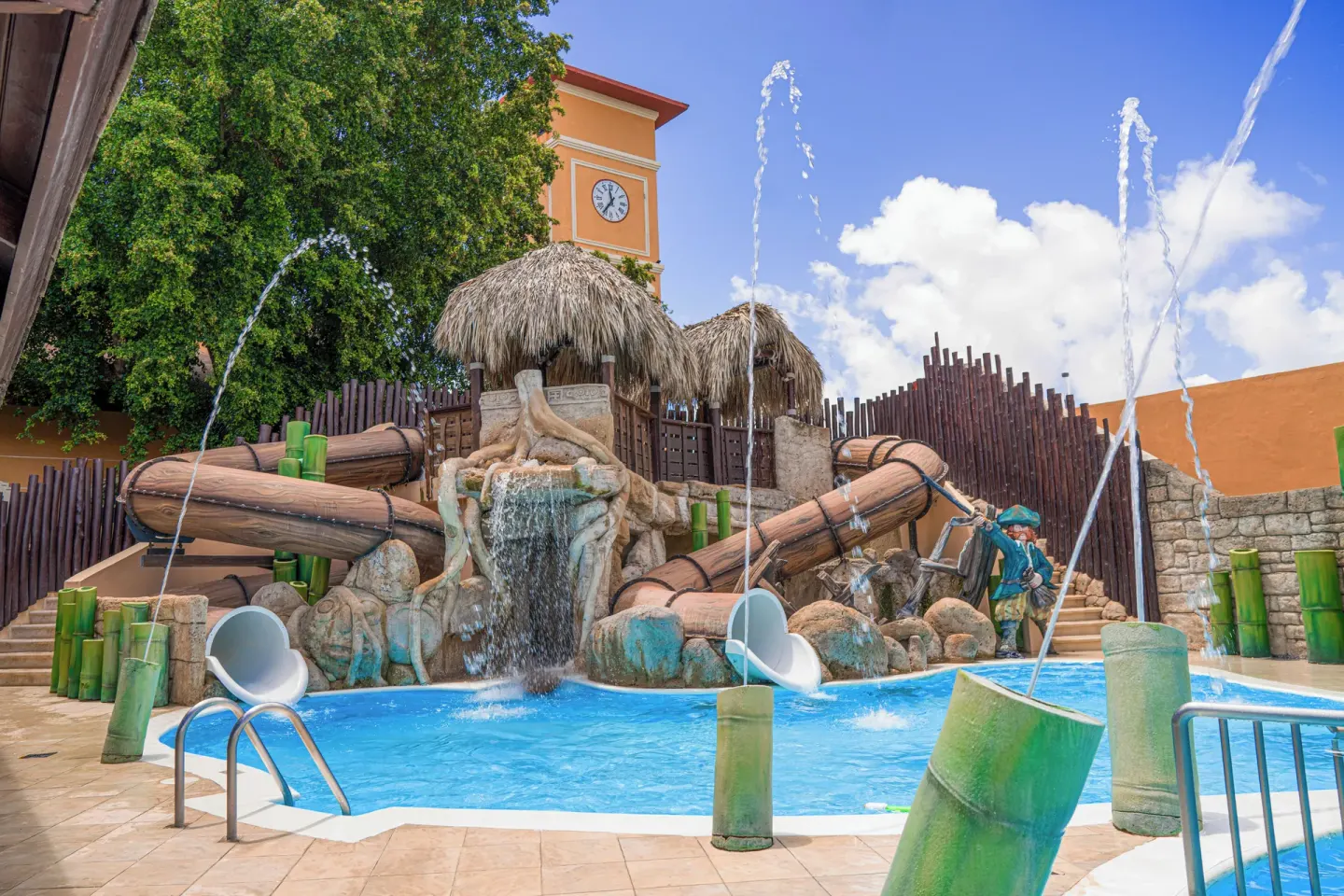 Water-play pool with slides and fountains at Majestic Mirage Punta Cana.
