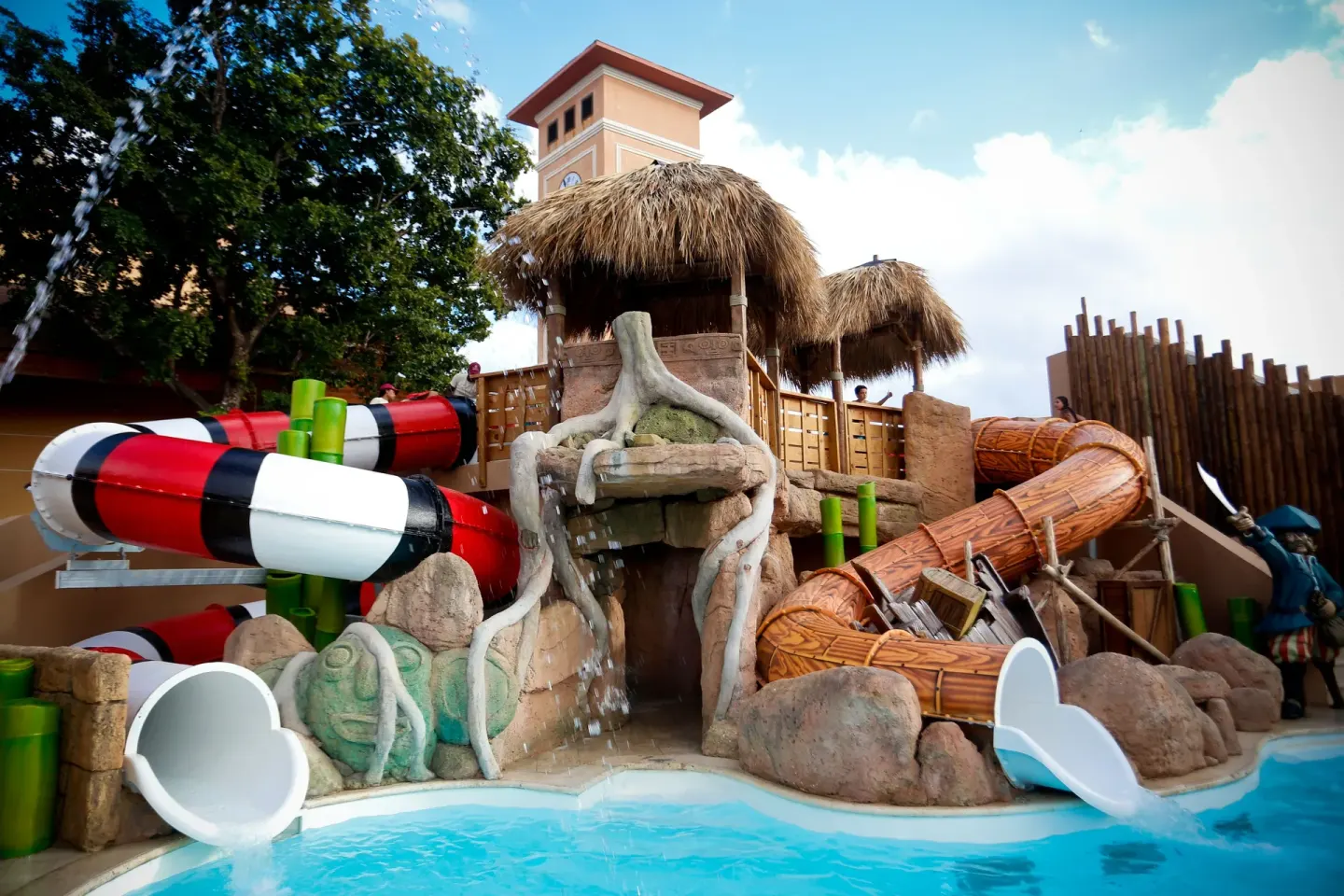 A pirate-themed kids water play area with slides at Majestic Mirage Punta Cana.