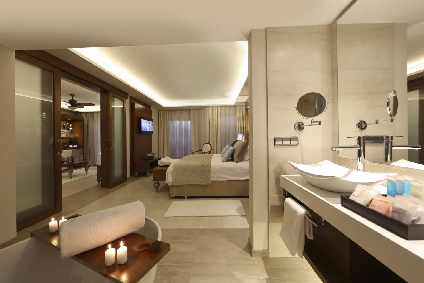 Jacuzzi bath and king bedroom in a Mirage Club suite at Majestic Mirage Punta Cana.