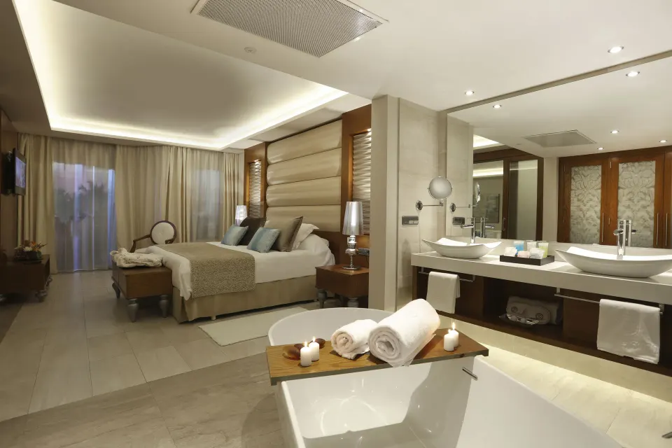 Mirage Club Swim Up Suite with king bed and open bath at Majestic Mirage Punta Cana.