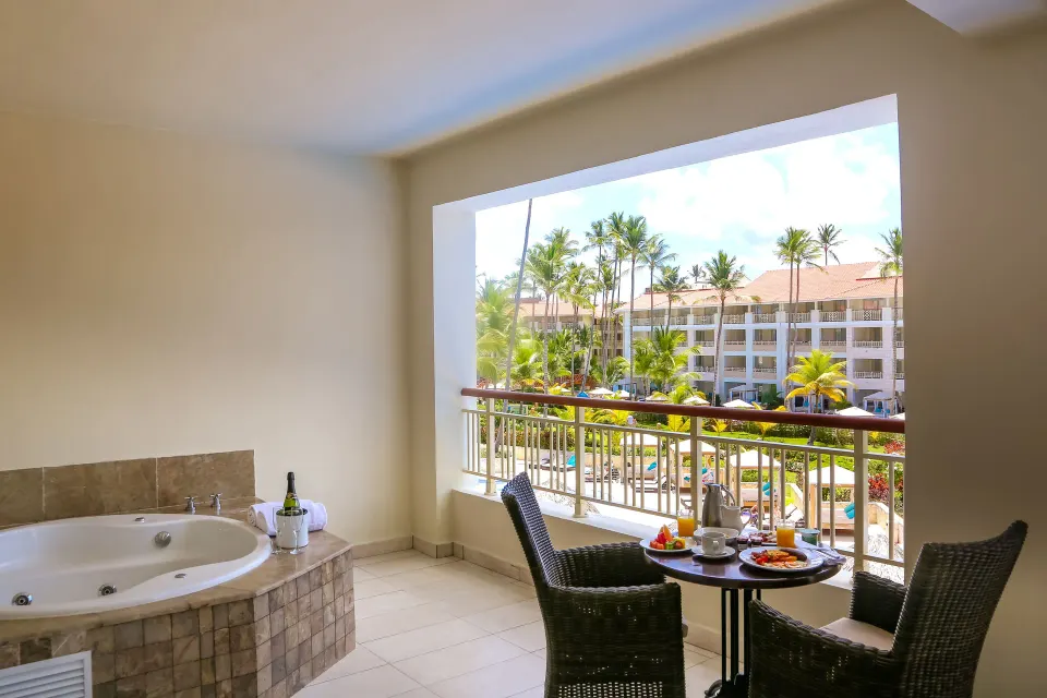 One Bedroom Suite balcony Jacuzzi and breakfast table at Majestic Mirage Punta Cana.