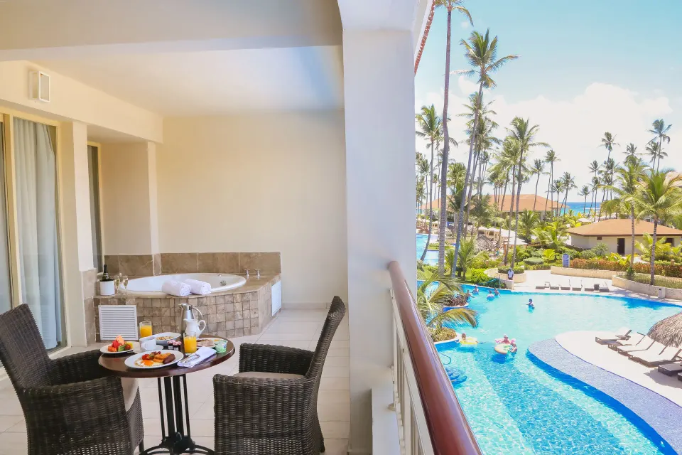 One Bedroom Suite balcony Jacuzzi overlooking the pool at Majestic Mirage Punta Cana.