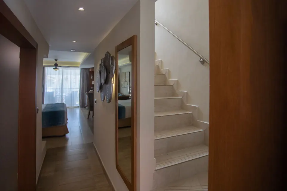 Sky View Suite hallway with stairs to the rooftop at Majestic Mirage Punta Cana.