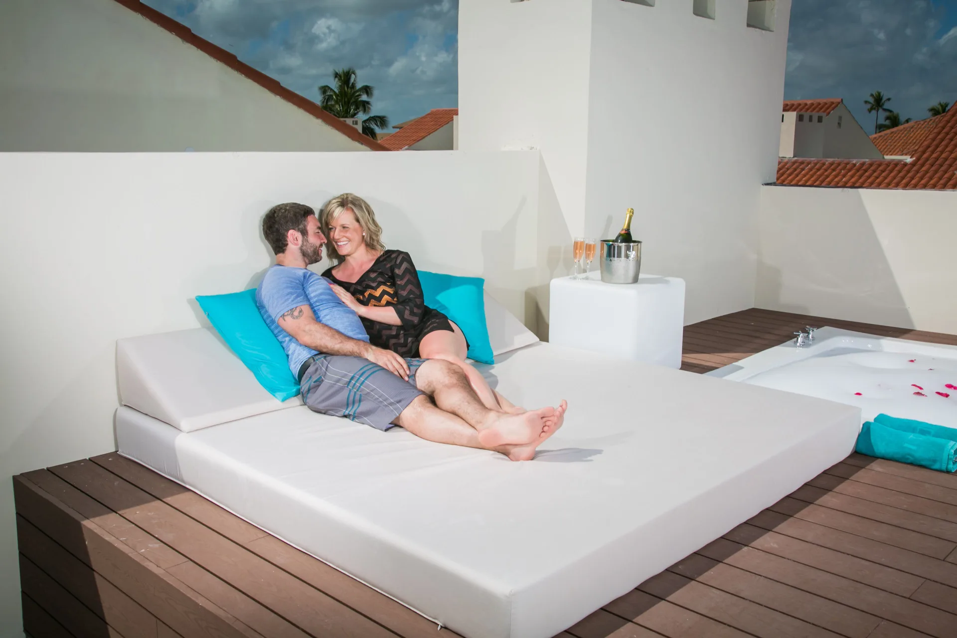 Sky View Suite rooftop terrace with daybed and Jacuzzi at Majestic Mirage Punta Cana.