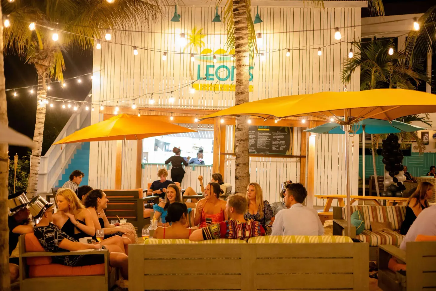Nighttime outdoor dining at Leon's at Meads Bay at Malliouhana Resort Anguilla.