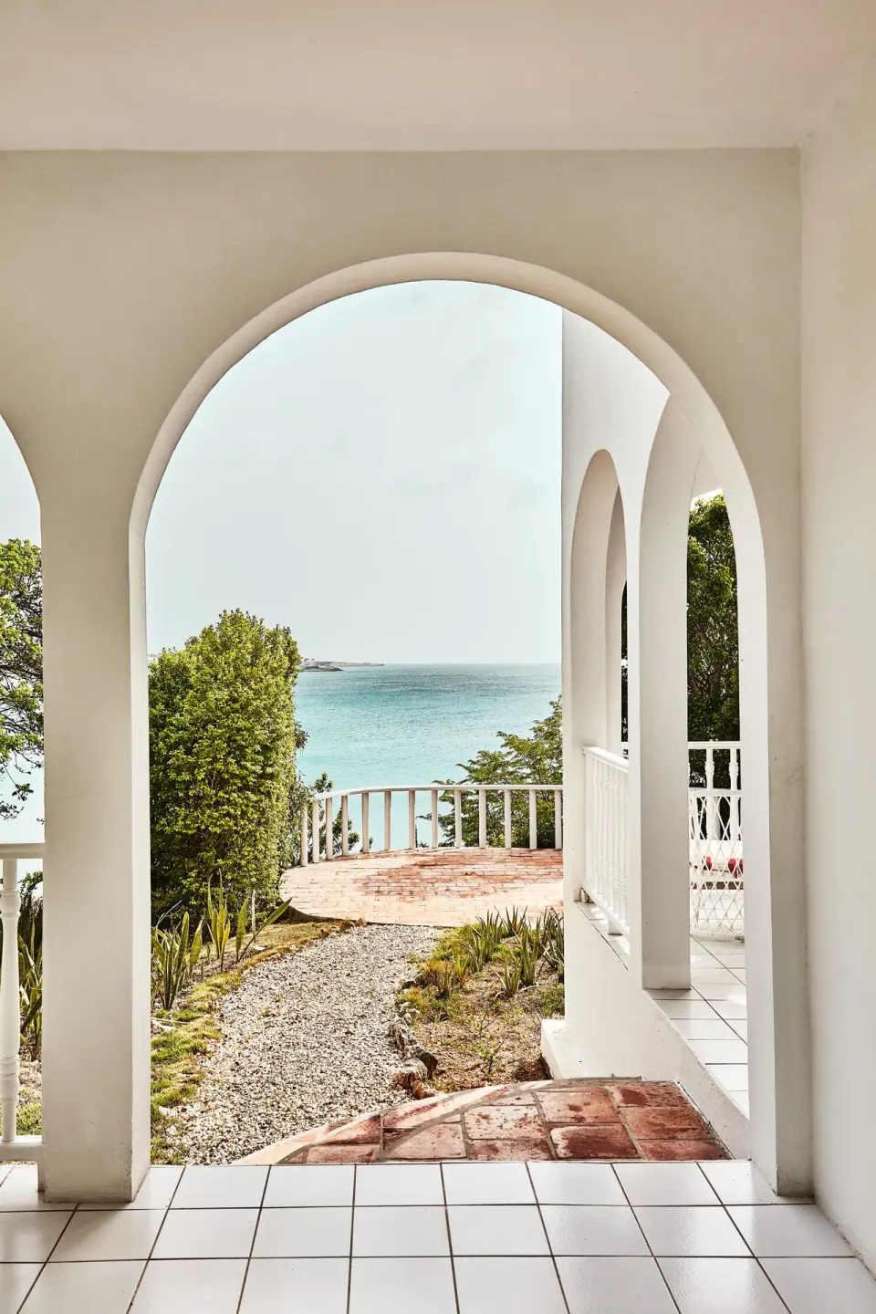 Ocean View Deluxe terrace arches overlooking the sea at Malliouhana Resort Anguilla.