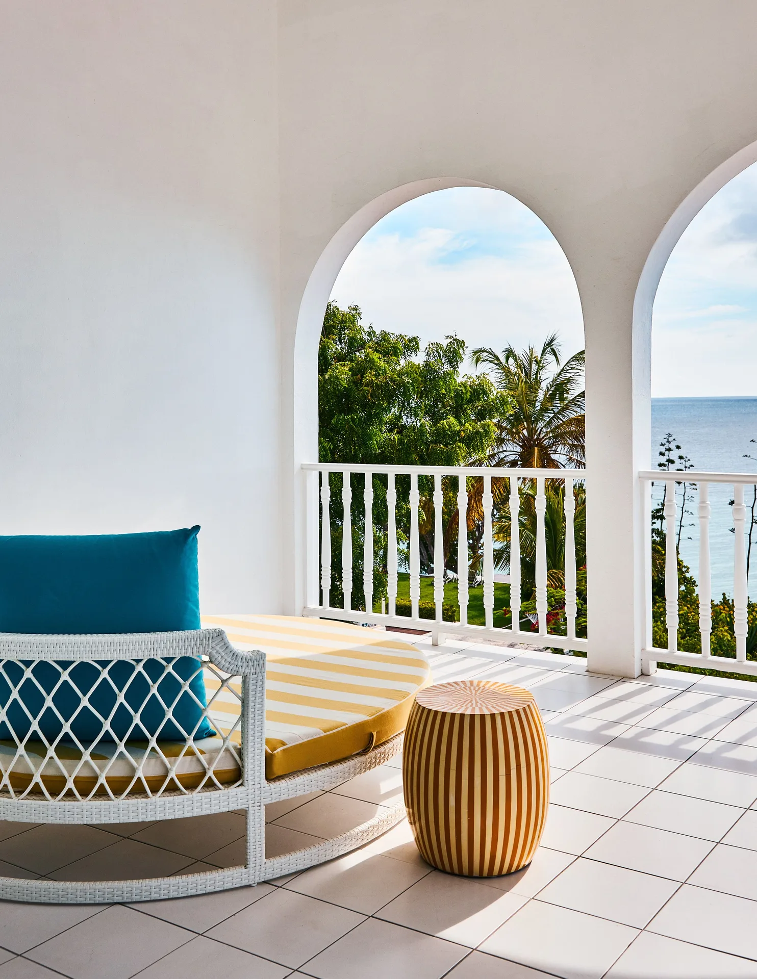 Ocean View Premium Two Beds terrace at Malliouhana Resort Anguilla with lounge seating and ocean glimpses.