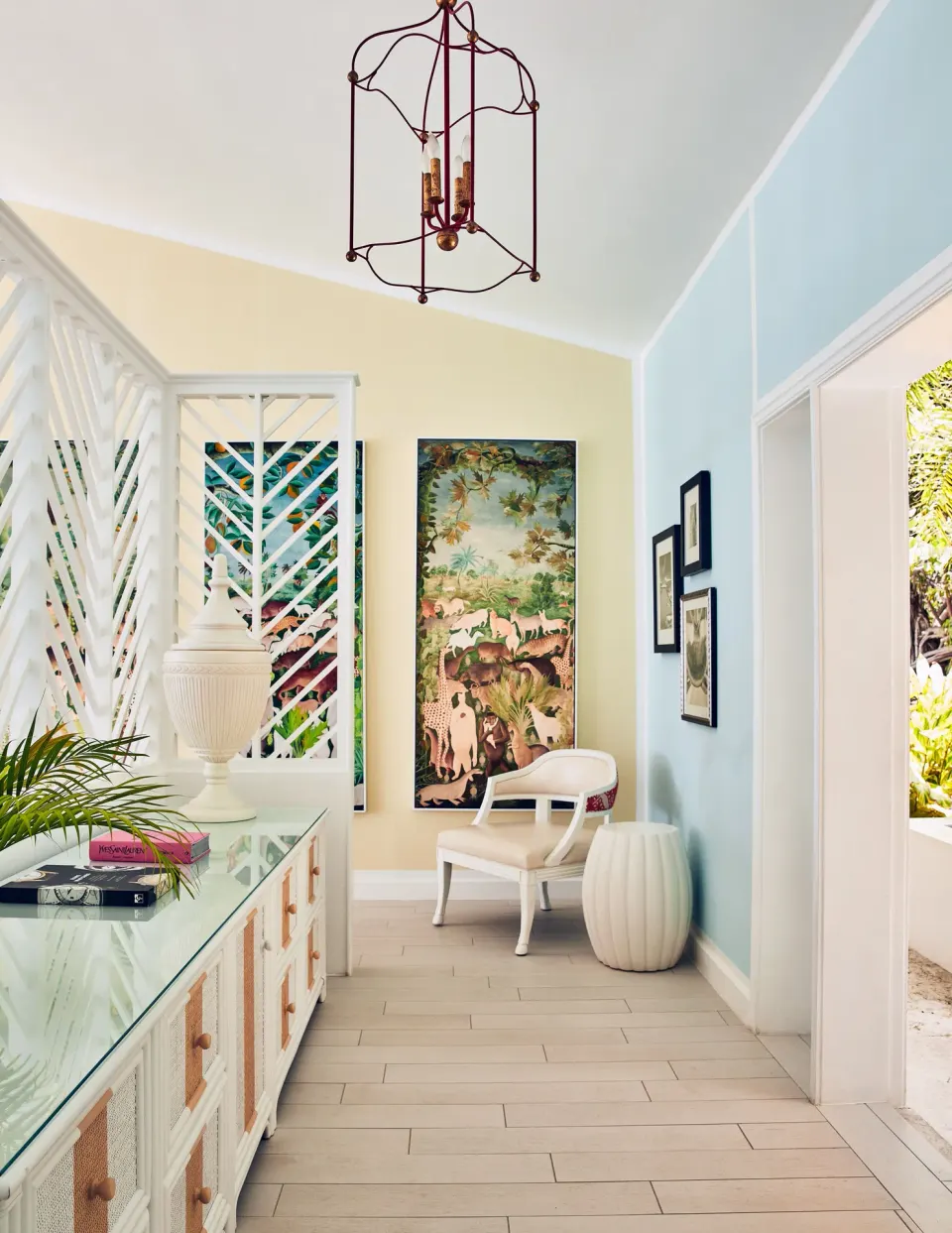 Turtle Cove Suite entry hall with art and seating at Malliouhana Resort Anguilla.