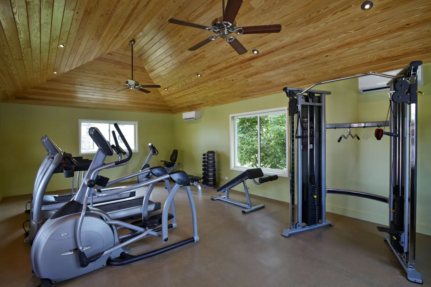 Fitness room with cardio and weight equipment at Manchebo Beach Resort and Spa.