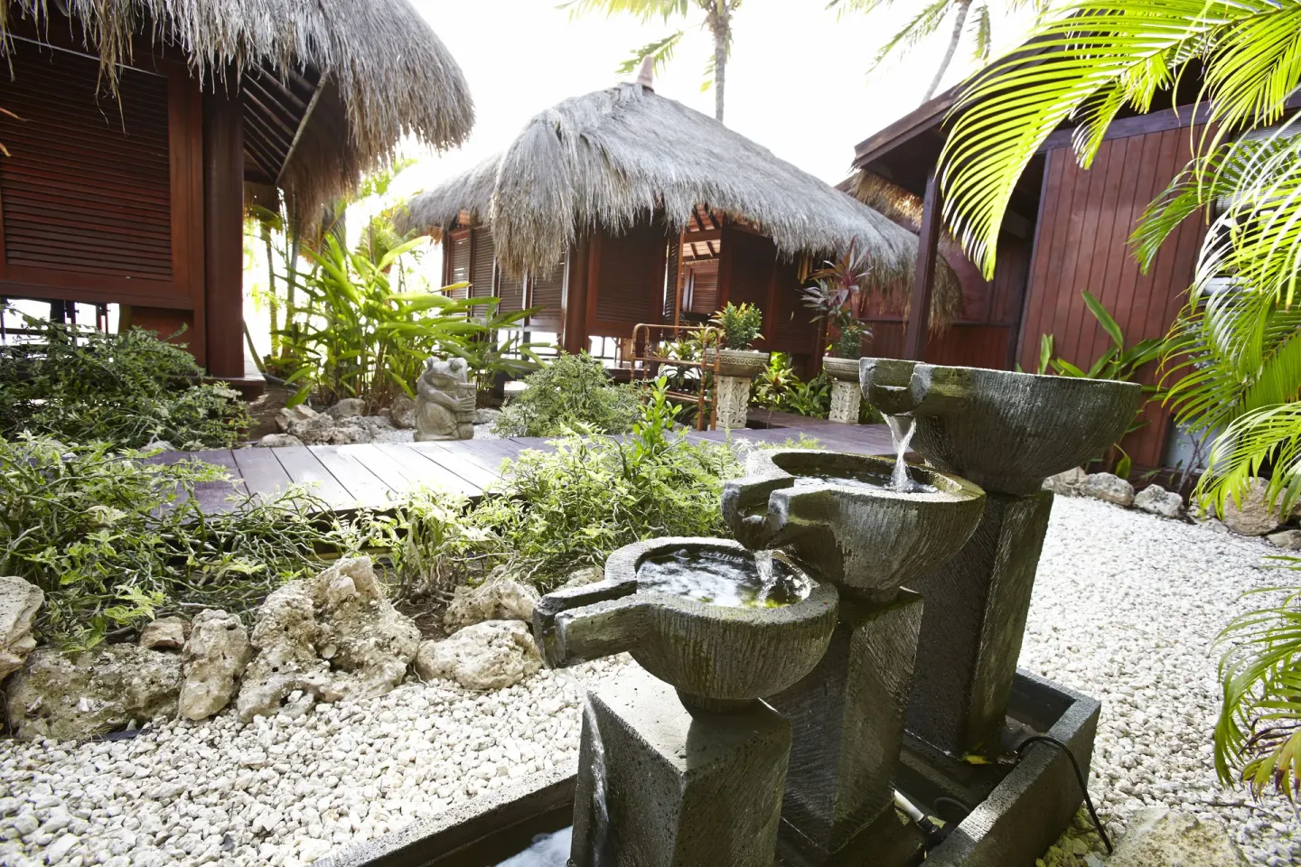 Tropical spa garden with a fountain at Manchebo Beach Resort and Spa.