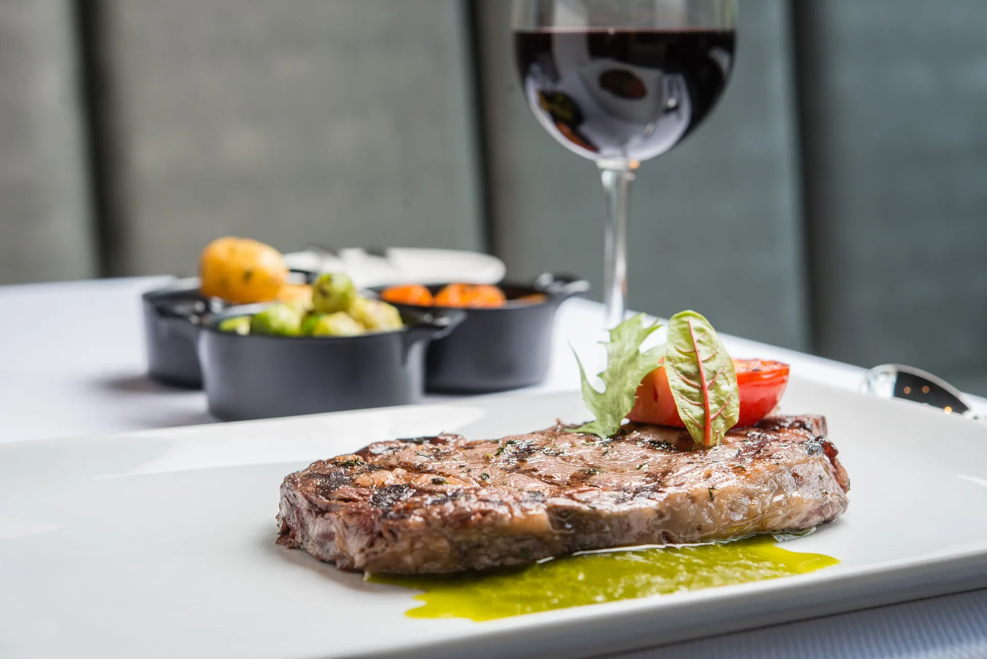 Grilled steak with vegetables and red wine at Manchebo Beach Resort and Spa.