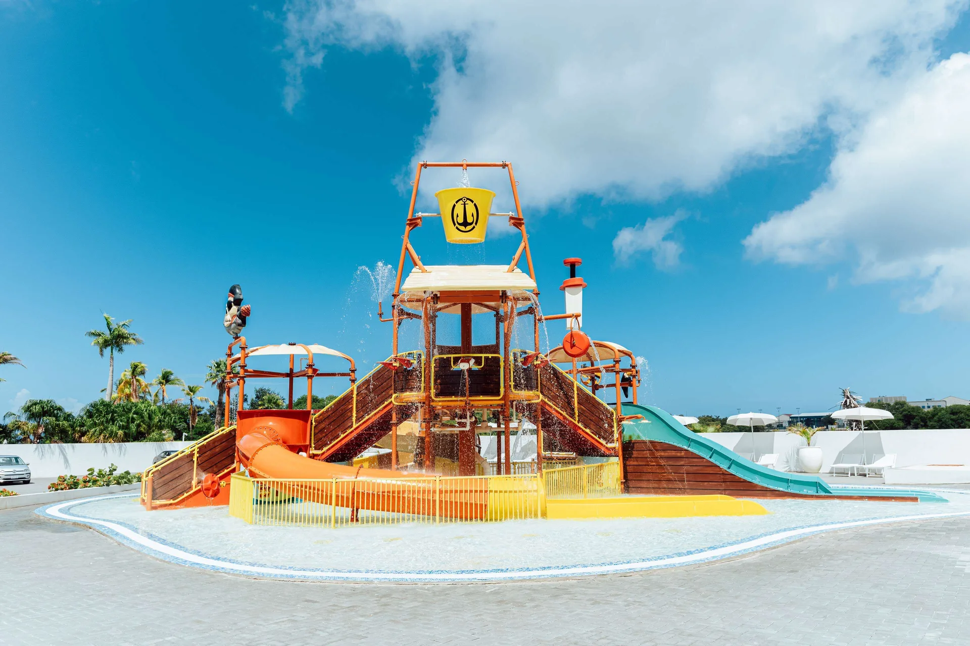 Colorful splash playground with slides at Mangrove Beach Corendon Curacao Resort.