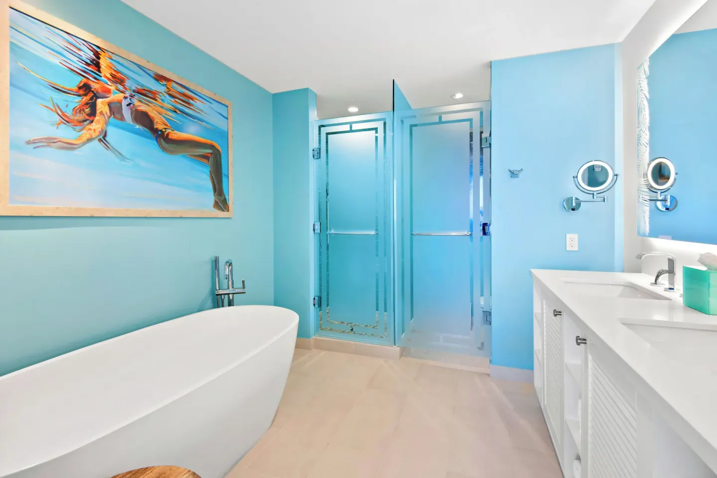 Guest bathroom with soaking tub and glass shower at Margaritaville Beach Resort - Nassau.