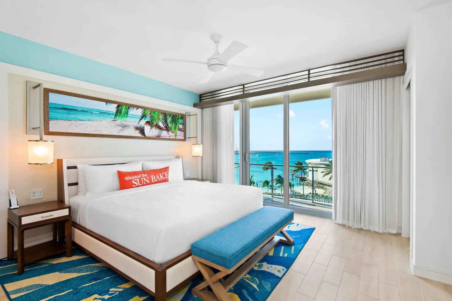 King bedroom with ocean-facing windows at Margaritaville Beach Resort - Nassau.
