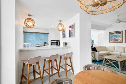Suite kitchen bar and living area at Margaritaville Beach Resort - Nassau.