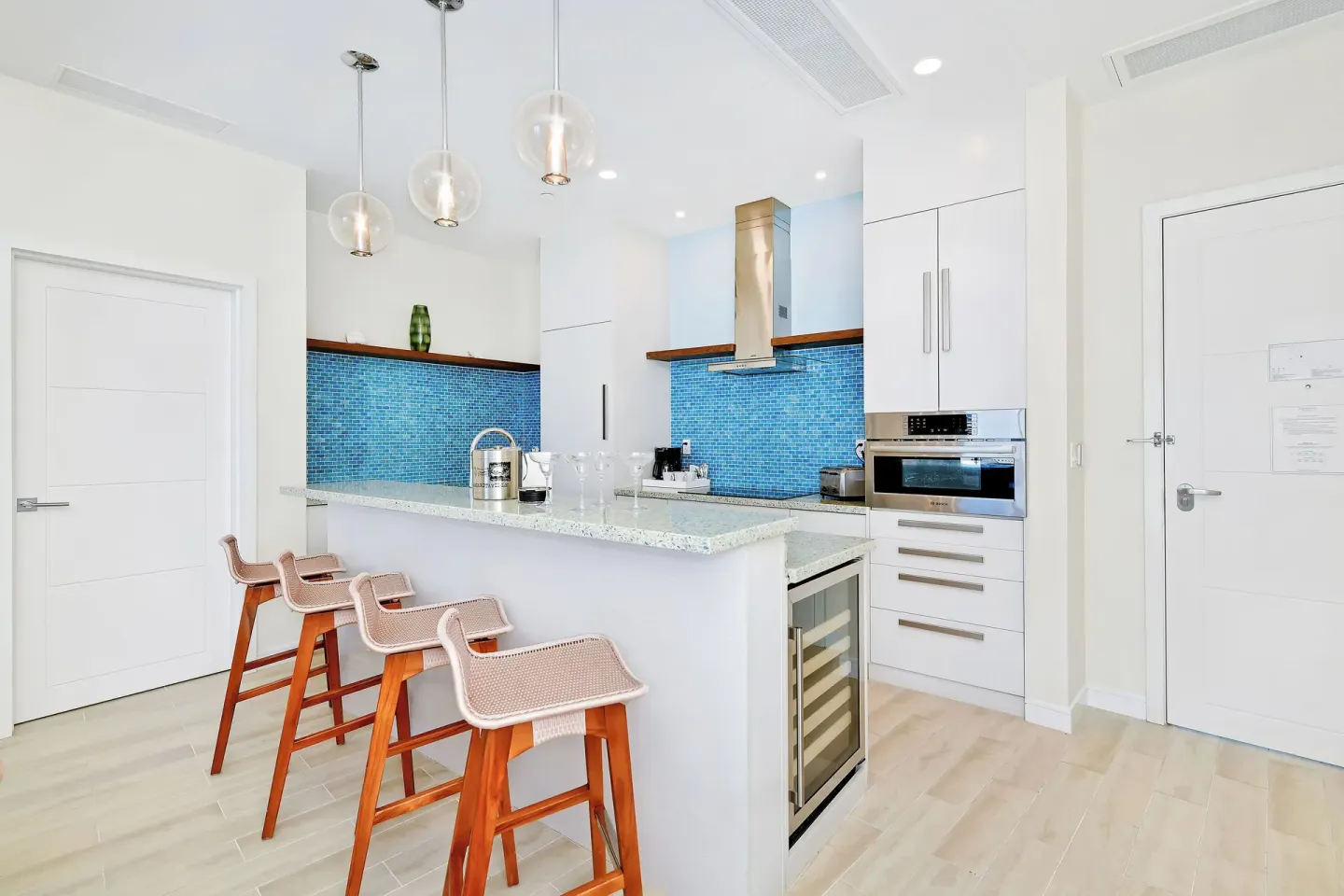 Suite kitchen with bar seating at Margaritaville Beach Resort - Nassau.