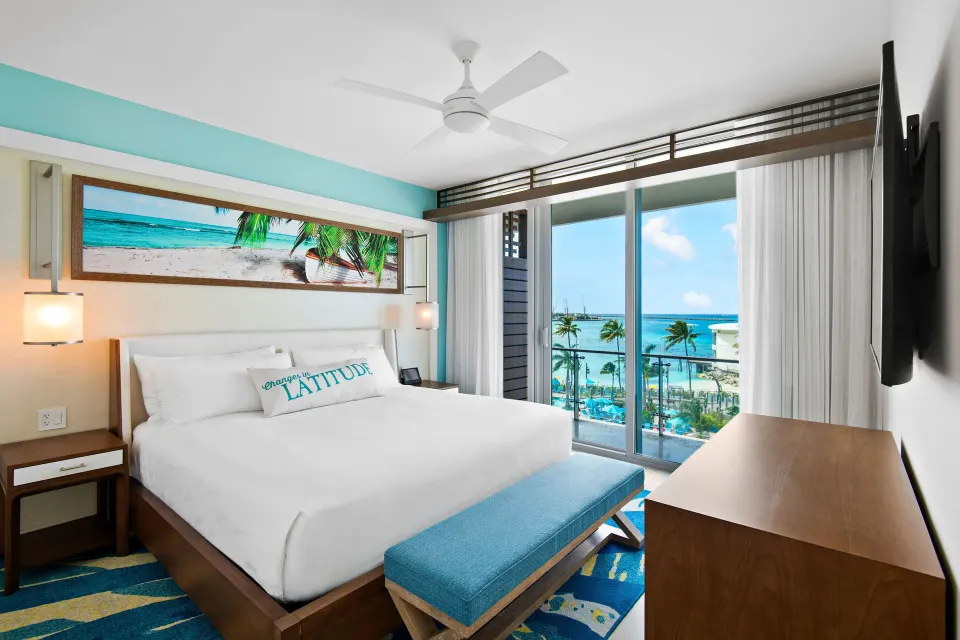 Deluxe oceanfront king room with balcony view at Margaritaville Beach Resort - Nassau.