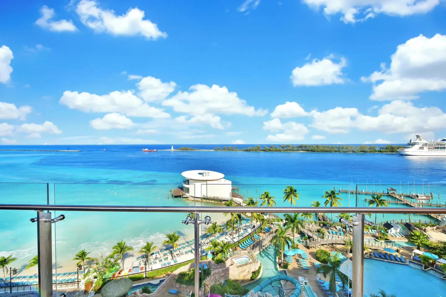 Oceanfront balcony view over beach and water at Margaritaville Beach Resort - Nassau.