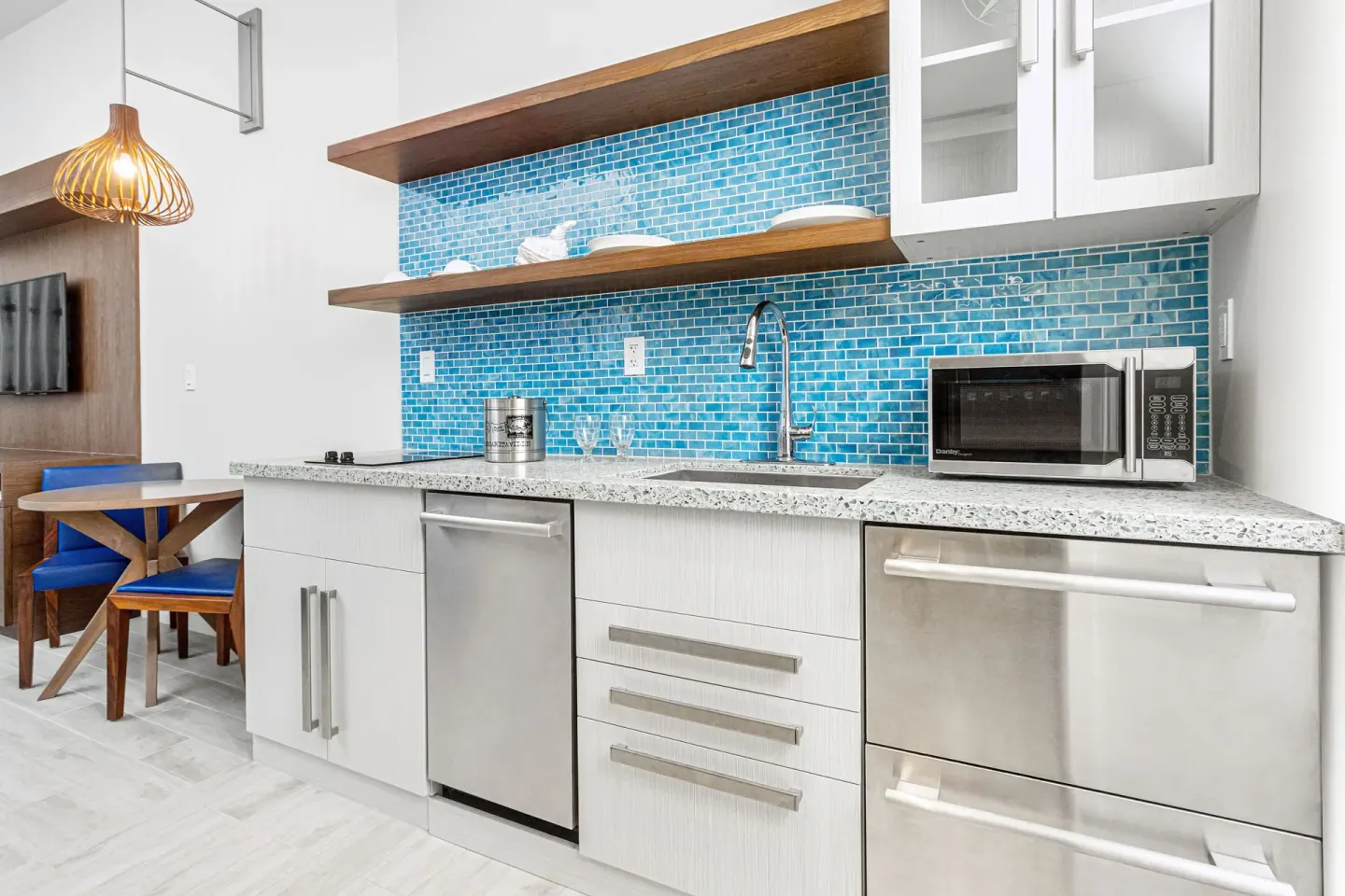 Studio kitchenette with blue tile backsplash at Margaritaville Beach Resort - Nassau.