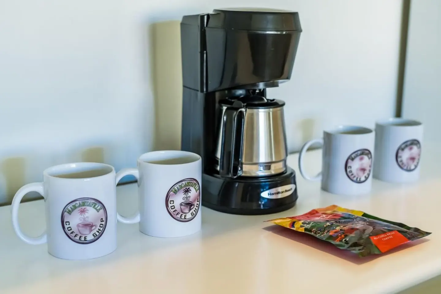 Standard Room coffee maker with mugs at Margaritaville Beach Resort Playa Flamingo.