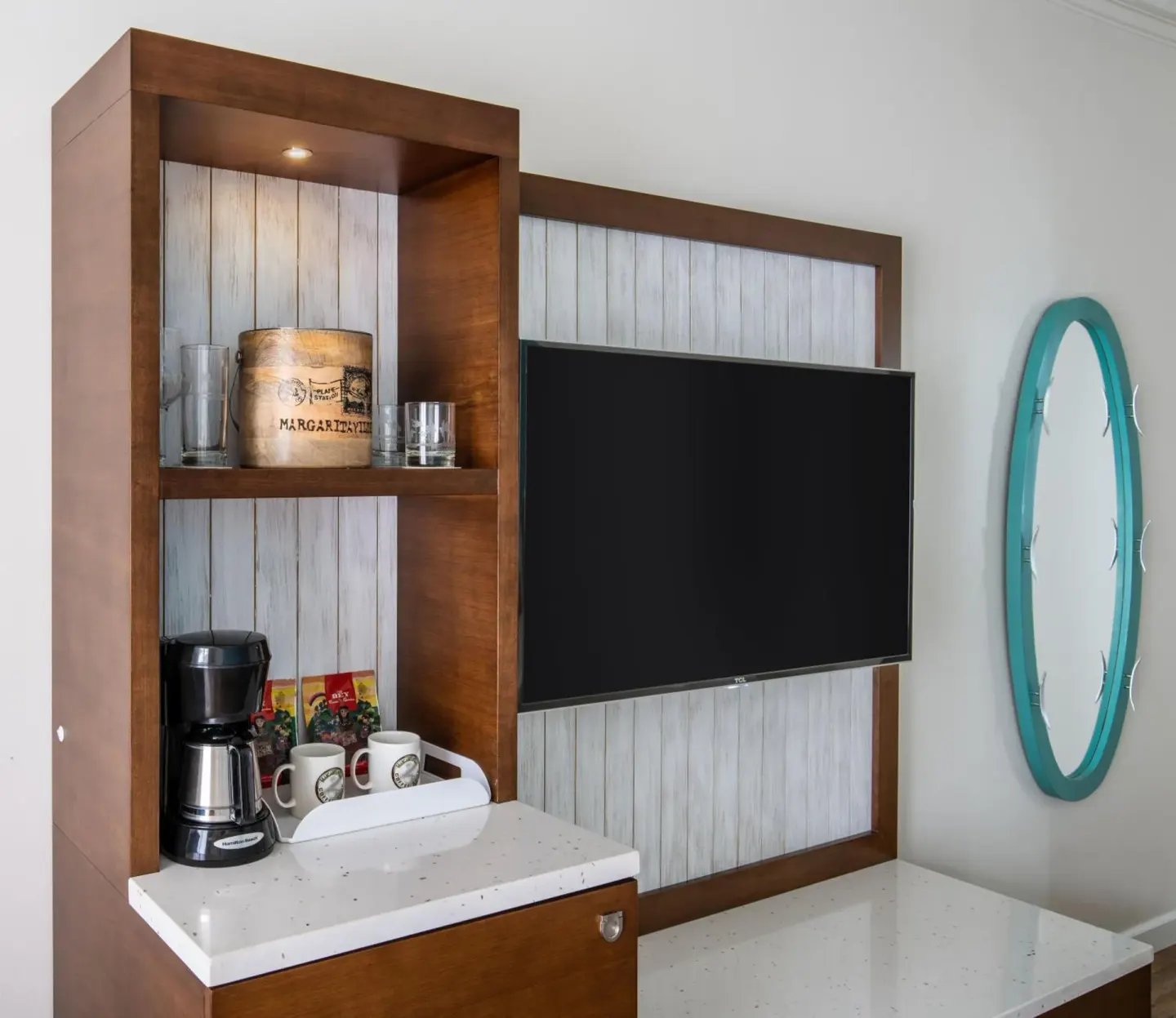 Standard Room TV wall and coffee station at Margaritaville Beach Resort Playa Flamingo.