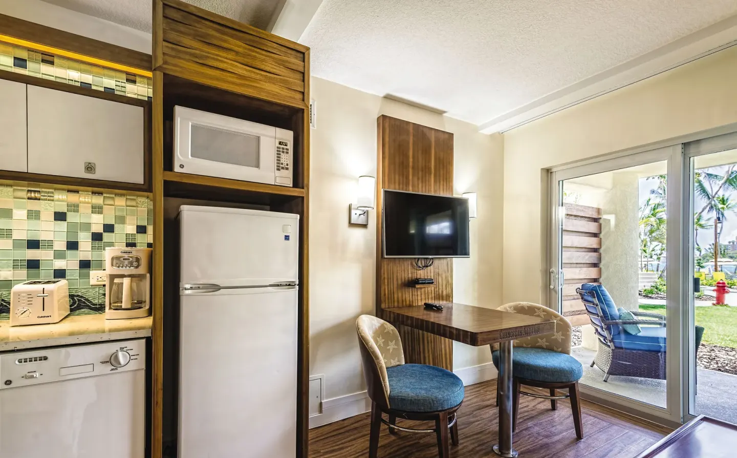 Guest room kitchenette and dining nook at Margaritaville Vacation Club - St. Thomas.
