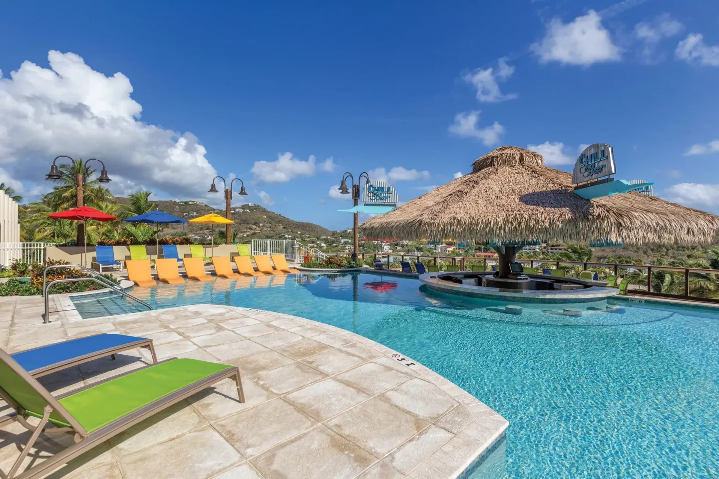 Rooftop-style pool with swim-up bar at Margaritaville Vacation Club - St. Thomas.
