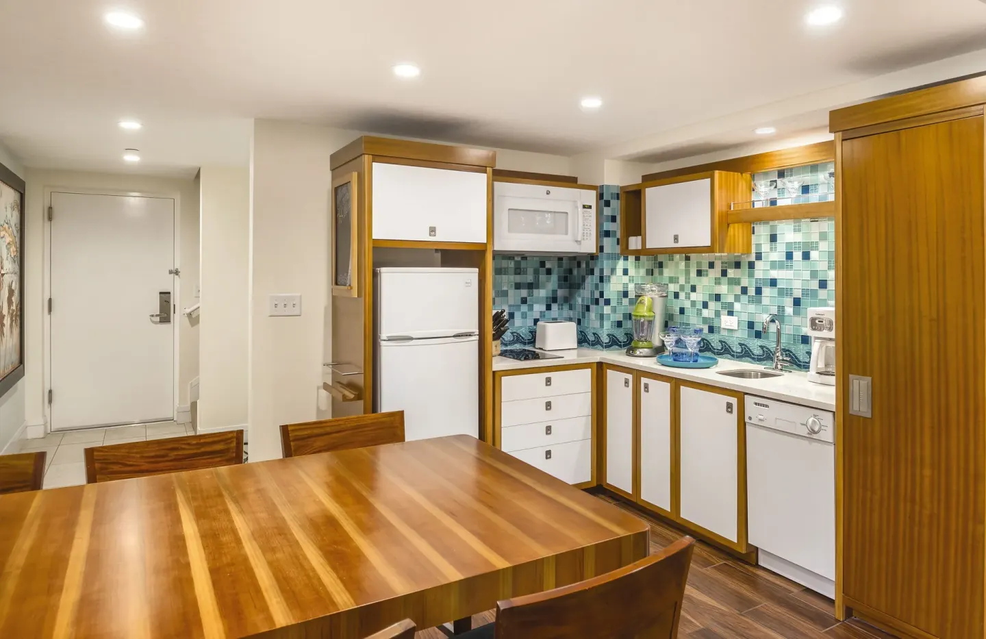 Suite kitchen and dining area at Margaritaville Vacation Club - St. Thomas.