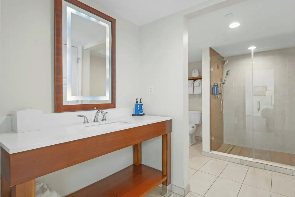 Bathroom vanity and glass shower in a condo at Margaritaville Vacation Club - St. Thomas.