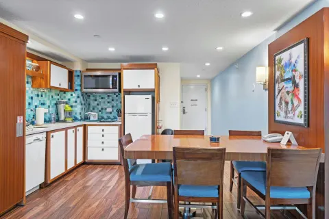 Kitchenette and dining table in a condo at Margaritaville Vacation Club - St. Thomas.
