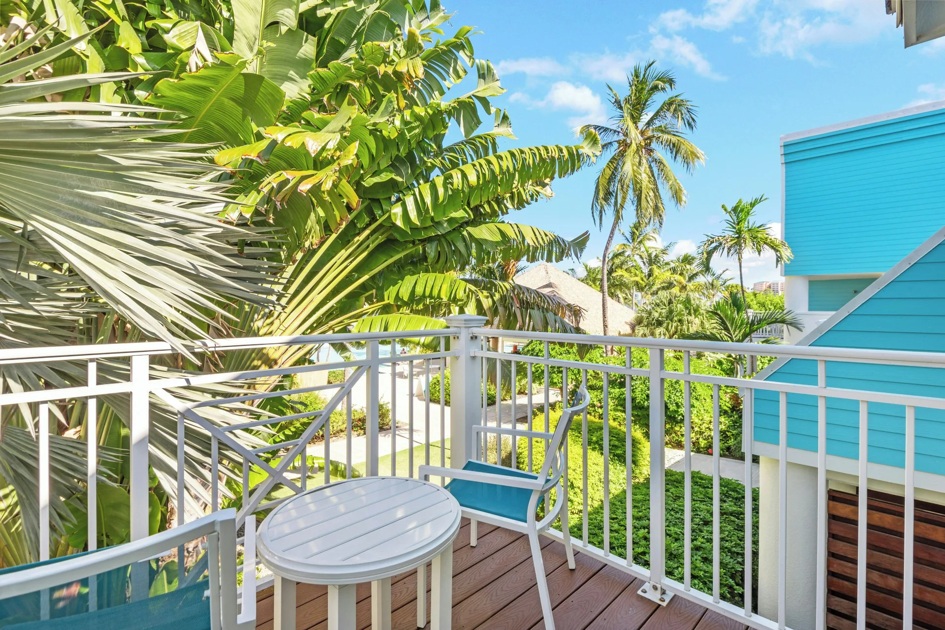 Studio Suite balcony with tropical foliage at Margaritaville Vacation Club - St. Thomas.