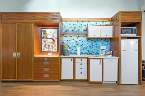 Studio suite kitchenette and wardrobe at Margaritaville Vacation Club - St. Thomas.