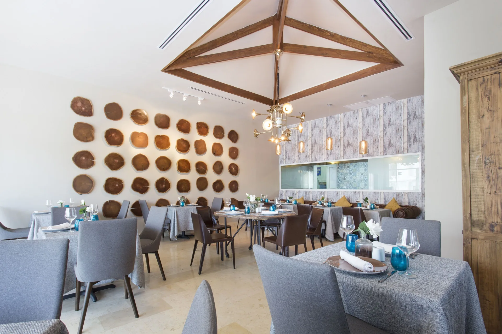 Modern restaurant dining room with set tables at Marien Puerto Plata.