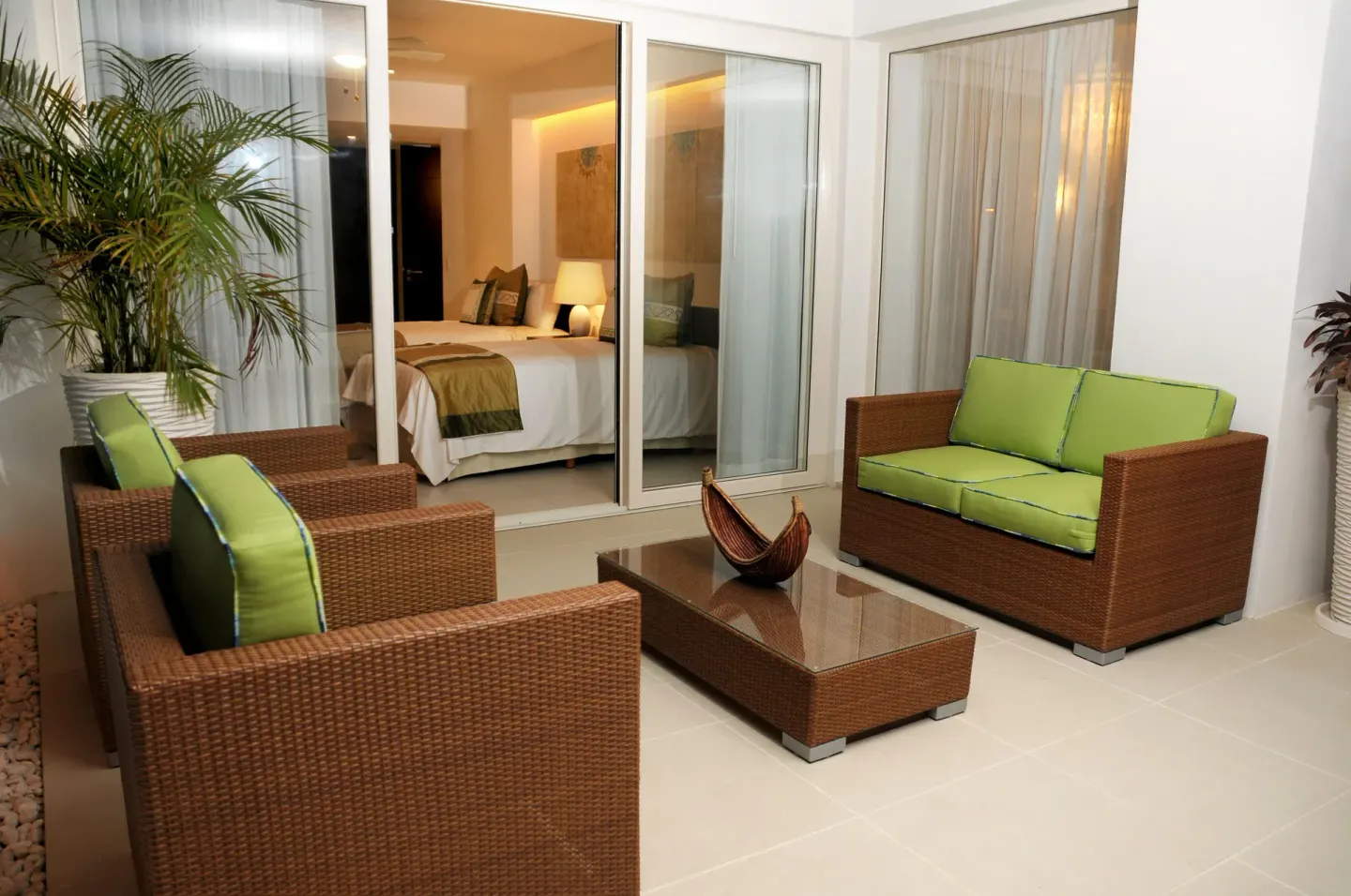 Private patio seating outside a guest room at Marival Distinct World Spa.