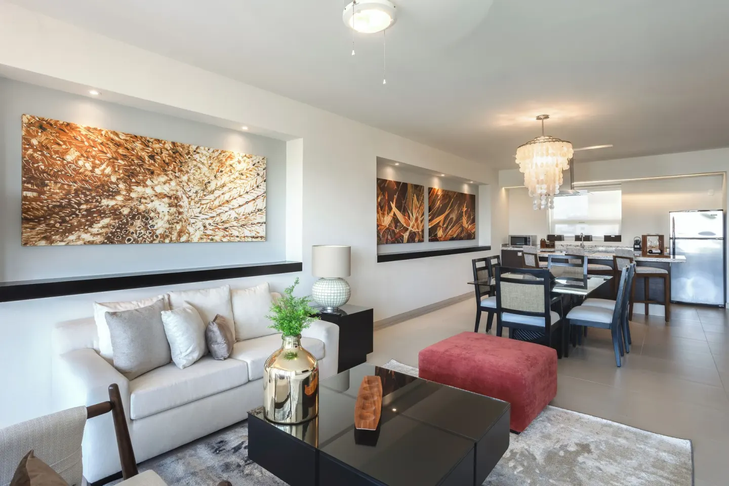 One-Bedroom Ocean View Suite living and dining area at Marival Distinct World Spa.