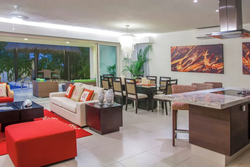 Three-Bedroom Villa living, dining, and kitchen area at Marival Distinct World Spa.