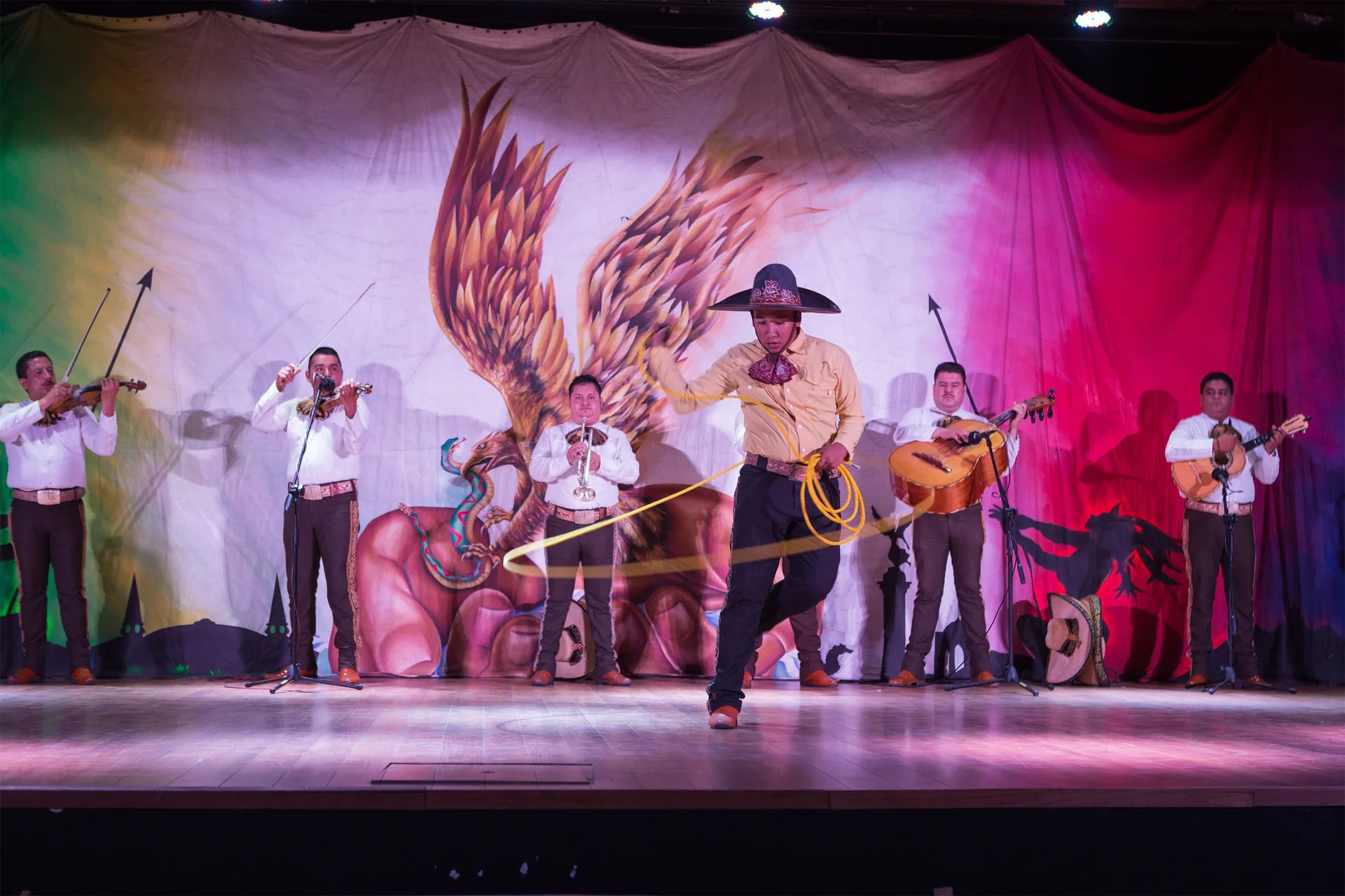 Musicians and a roper perform a stage show at Marival Emotions Resort.