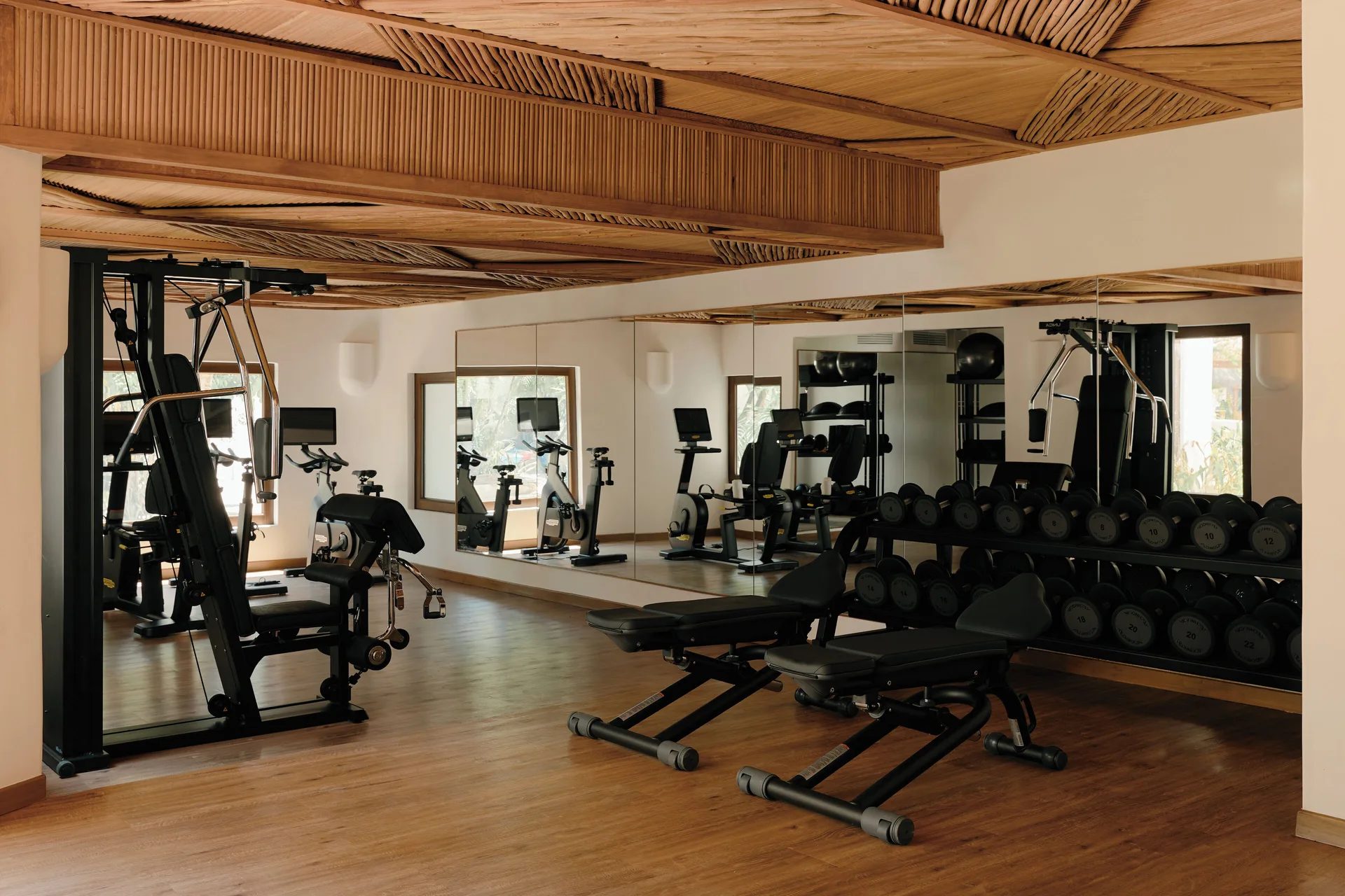 Fitness room with weights, benches and cardio equipment at Maroma, Riviera Maya.